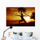 Woman Doing Yoga By The Ocean At Sunset Under Palm Tree Wall Mural