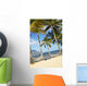 Two Hammocks Hang Between Palm Trees On Sandy Tropical Beach Wall Mural