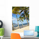 Two Hammocks Hang Between Palm Trees On Sandy Tropical Beach Wall Mural