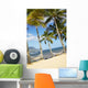 Two Hammocks Hang Between Palm Trees On Sandy Tropical Beach Wall Mural
