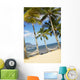 Two Hammocks Hang Between Palm Trees On Sandy Tropical Beach Wall Mural