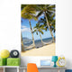 Two Hammocks Hang Between Palm Trees On Sandy Tropical Beach Wall Mural