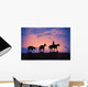Silhouette Of Donkey Train Statue Against Sunset Wall Mural