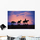 Silhouette Of Donkey Train Statue Against Sunset Wall Mural