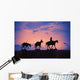 Silhouette Of Donkey Train Statue Against Sunset Wall Mural