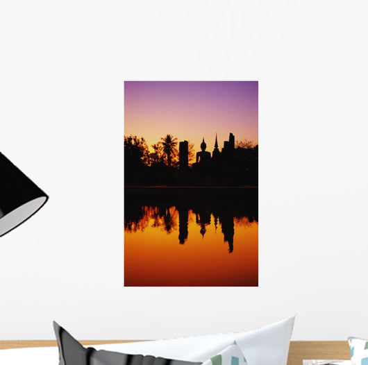 Silhouetted And Reflecting On Water Wall Mural