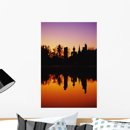 Silhouetted And Reflecting On Water Wall Mural