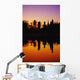 Silhouetted And Reflecting On Water Wall Mural