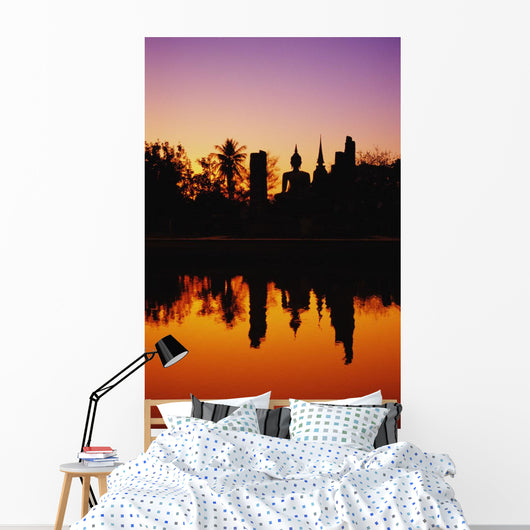 Silhouetted And Reflecting On Water Wall Mural