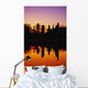 Silhouetted And Reflecting On Water Wall Mural