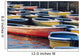 Japan, Tokyo, Ueno Park, Colorful Row Boats Tied Together On Lake Wall Mural