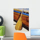 Wooden paddle and outrigger canoe on beach Wall Mural