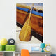 Wooden paddle and outrigger canoe on beach Wall Mural