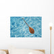 Overhead View Of Paddle Floating On Surface Of Turquoise Water Wall Mural