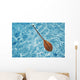 Overhead View Of Paddle Floating On Surface Of Turquoise Water Wall Mural