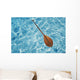 Overhead View Of Paddle Floating On Surface Of Turquoise Water Wall Mural