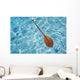 Overhead View Of Paddle Floating On Surface Of Turquoise Water Wall Mural
