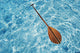 Overhead View Of Paddle Floating On Surface Of Turquoise Water Wall Mural