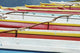 Hawaii, Oahu, Lineup Of Colorful Outrigger Canoes Wall Mural