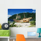 Shipwrecked fishing boat on beach Wall Mural