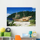 Shipwrecked fishing boat on beach Wall Mural