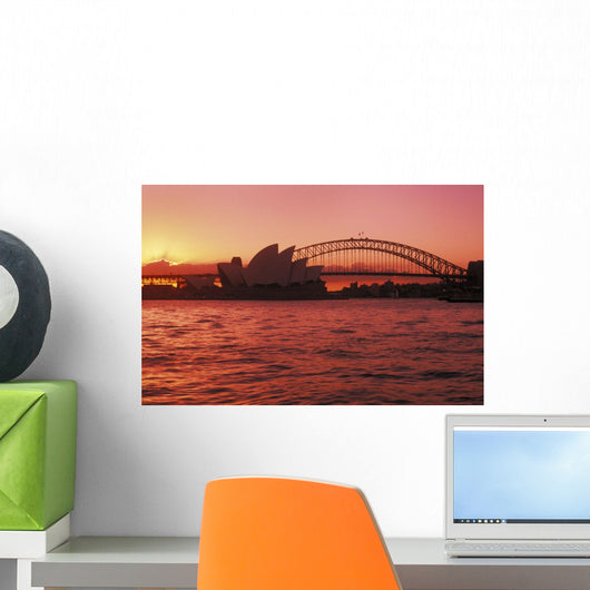 Australia, New South Wales, Opera House and Harbor Bridge at sunset Wall Mural