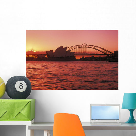 Australia, New South Wales, Opera House and Harbor Bridge at sunset Wall Mural