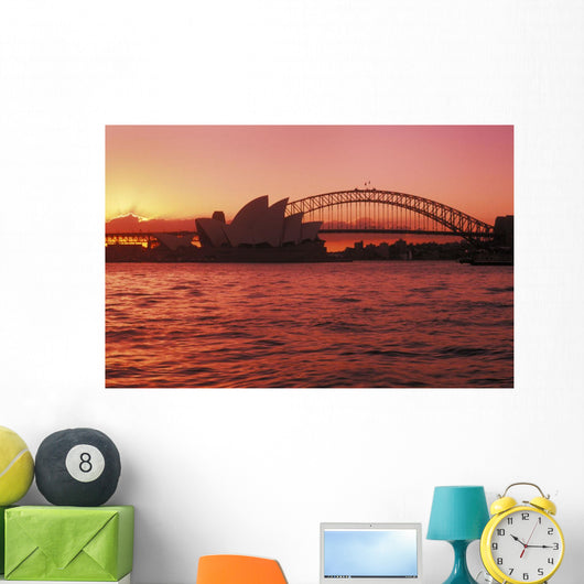 Australia, New South Wales, Opera House and Harbor Bridge at sunset Wall Mural