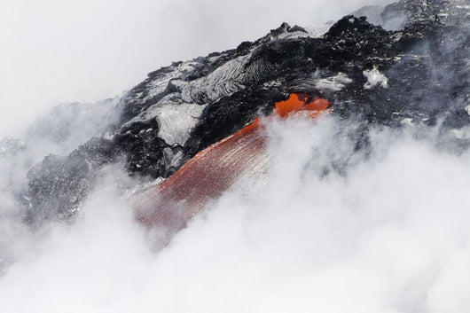 Steam cloud nearly hiding red hot lava flow pouring into Pacific Ocean Wall Mural