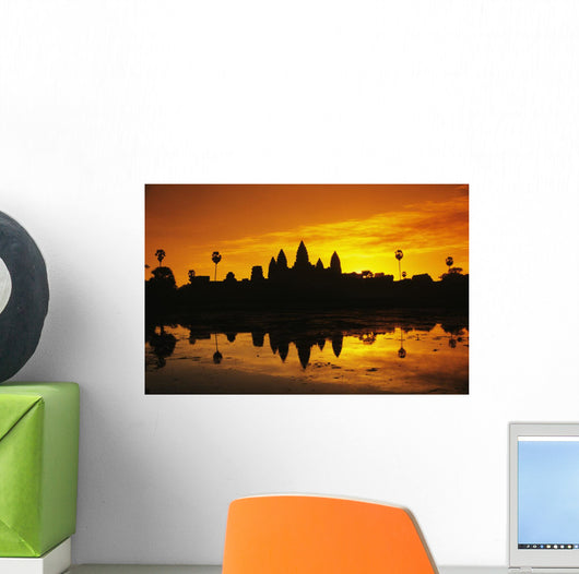 Silhouette of temple against orange sky during sunrise Wall Mural