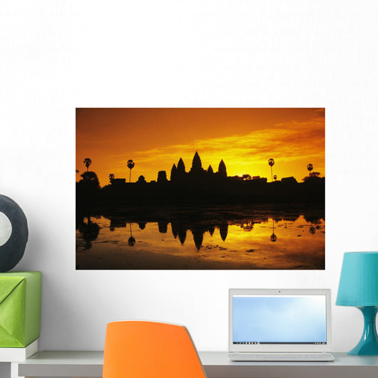 Silhouette of temple against orange sky during sunrise Wall Mural
