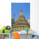 Thailand, Bangkok, Colorful Pointed Steeples Against Clear Blue Sky Wall Mural