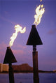 Tiki Torches Burn At Sunset With Diamond Head In Background Wall Mural