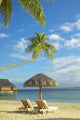 Lounge Chairs And Thatch Umbrella Wall Mural