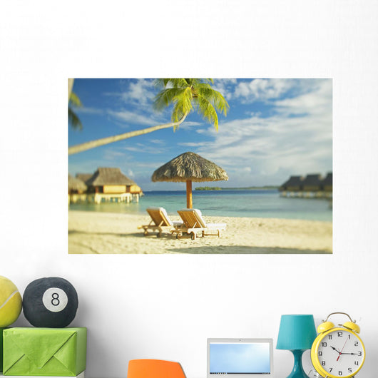 Lounge Chairs And Thatch Umbrella Wall Mural