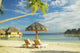 Lounge Chairs And Thatch Umbrella Wall Mural