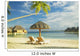 Lounge Chairs And Thatch Umbrella Wall Mural