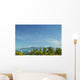 Palm Trees And Grass Huts In Foreground Wall Mural