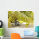 French Polynesia, Tuamotu, Palm Tree With Two Bikes Leaned Against It Wall Mural