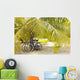 French Polynesia, Tuamotu, Palm Tree With Two Bikes Leaned Against It Wall Mural