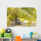 French Polynesia, Tuamotu, Palm Tree With Two Bikes Leaned Against It Wall Mural