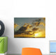Sun Shining Through Clouds Over The Ocean At Sunset Wall Mural