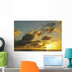 Sun Shining Through Clouds Over The Ocean At Sunset Wall Mural