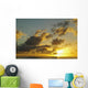 Sun Shining Through Clouds Over The Ocean At Sunset Wall Mural