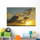 Sun Shining Through Clouds Over The Ocean At Sunset Wall Mural