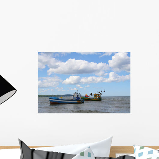old fishing boats against beautiful sky Wall Mural