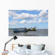 old fishing boats against beautiful sky Wall Mural