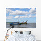 old fishing boats against beautiful sky Wall Mural