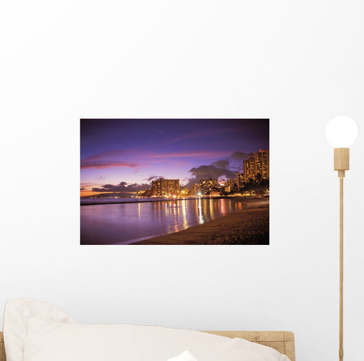 Reflection Of City Lights On The Ocean At Twilight Wall Mural