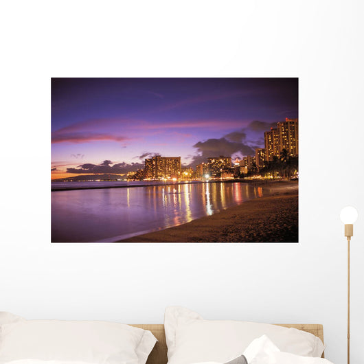 Reflection Of City Lights On The Ocean At Twilight Wall Mural